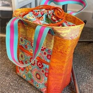 Vibrant Orange and Blue Tote Bag with Woven Material and Adjustable Straps